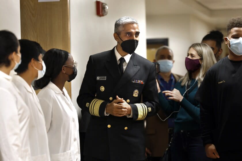 Los Angeles, California-Dec. 6, 2021-United States Surgeon General Vivek H. Murthy tours King/Drew Magnet High School of Medicine and Science before talking to a panel of students about mental health issues. United States Surgeon General Vivek H. Murthy announced a national youth mental health advisory to call attention to a situation that he considers to be a crisis among teens in the wake of the pandemic. (Carolyn Cole / Los Angeles Times)