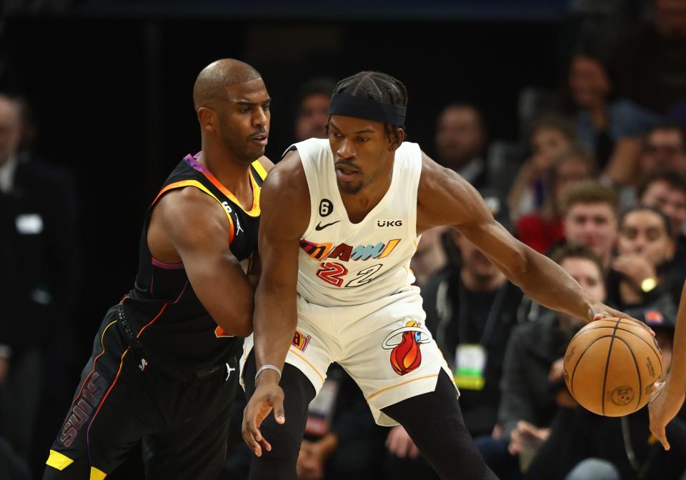 Jan 6, 2023; Phoenix, Arizona, USA; Phoenix Suns guard Chris Paul (3) defends against Miami Heat forward Jimmy Butler (22) in the first half at Footprint Center. Mandatory Credit: Mark J. Rebilas-USA TODAY Sports