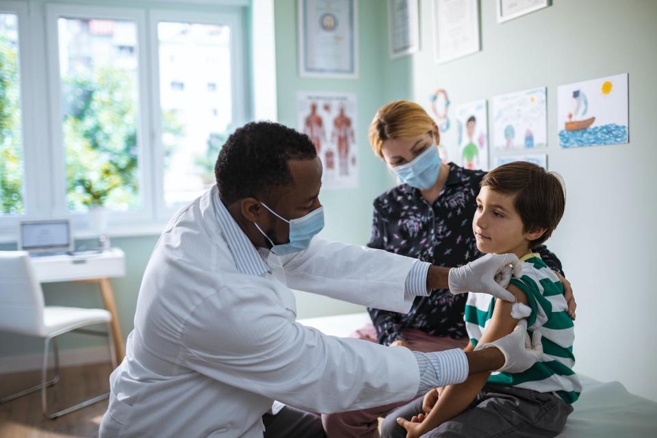 The early surge of respiratory infections underscores the need to get children up to date on flu and COVID-19 vaccinations. <a href="https://www.gettyimages.com/detail/photo/little-boy-getting-vaccinated-at-the-pediatricians-royalty-free-image/1266488183?phrase=flu%20shots%20kids&adppopup=true" rel="nofollow noopener" target="_blank" data-ylk="slk:Geber86/E+ via Getty Images;elm:context_link;itc:0;sec:content-canvas" class="link ">Geber86/E+ via Getty Images</a>