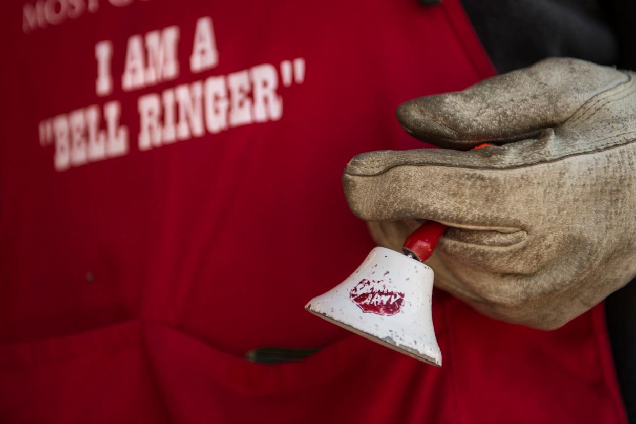 In this file photo, Salvation Army bell ringer Robert Thompson holds a well-worn bell while collecting donations on Dec. 21, 2018, in front of the Hobby Lobby on South College Avenue in Fort Collins.