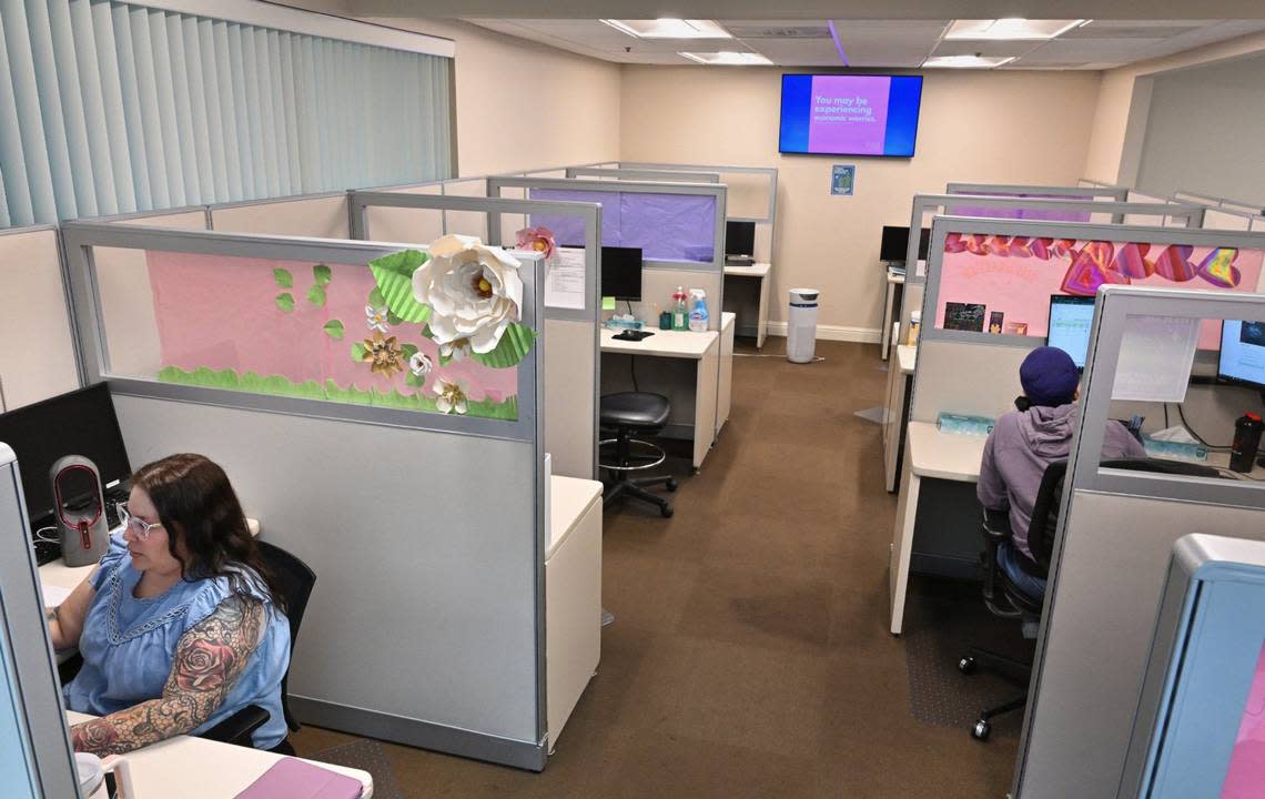 Staff answer crises phone calls at the 988 Suicide & Crises Lifeline call center Friday, April 26, 2024 in Fresno.