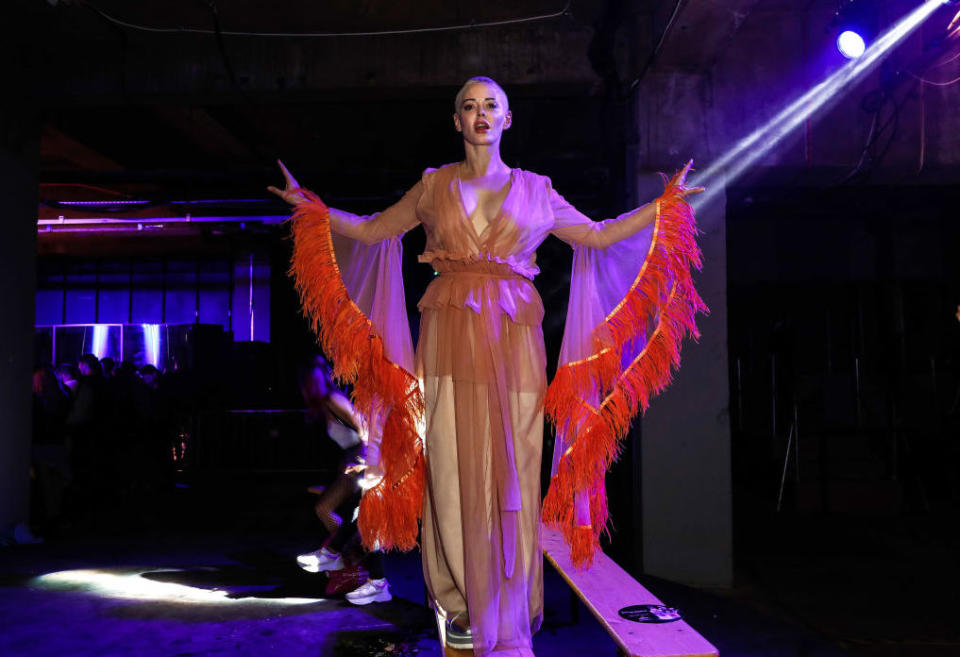 The actress swiftly changed into a sheer number (with seriously feathered sleeves) for the Gareth Pugh after-party on September 15 [Photo: Getty]