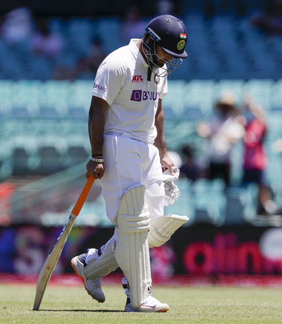 India's Rishabh Pant reacts as he leaves the field after he was dismissed on 97 during play on the final day of the third cricket test between India and Australia at the Sydney Cricket Ground, Sydney, Australia, Monday, Jan. 11, 2021. (AP Photo/Rick Rycroft)