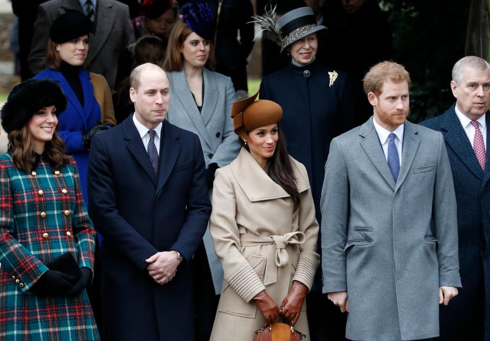 A photo of Britain's Catherine, Duchess of Cambridge, (L) and Britain's Prince William, Duke of Cambridge, (2L), US actress and fiancee of Britain's Prince Harry Meghan Markle (2R) and Britain's Prince Harry (R) stand together as they wait to see off Britain's Queen Elizabeth II after attending the Royal Family's traditional Christmas Day church service at St Mary Magdalene Church in Sandringham, Norfolk, eastern England, on December 25, 2017.