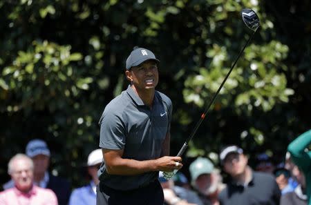 Tiger Woods of the U.S. watches his drive off the 9th tee during first round play of the 2018 Masters golf tournament at the Augusta National Golf Club in Augusta, Georgia, U.S., April 5, 2018. REUTERS/Brian Snyder