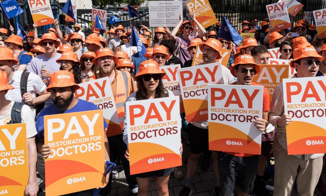 <span>Junior doctors rallying outside Downing Street in June. Work was stopped on 44 days during the strike.</span><span>Photograph: Wiktor Szymanowicz/REX/Shutterstock</span>