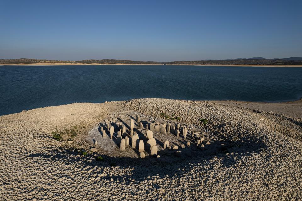 The Dolmen of Guadalperal, sometimes also known as "The Spanish Stonehenge" is seen above the water level at the Valdecanas reservoir, which is at 27 percent capacity, on July 28, 2022 in Caceres province, Spain.