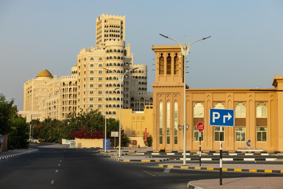 The Waldorf Astoria Ras Al Khaimah hotel, left, in the Al Hamra Village. Last year, the emirate set a record for annual visitors. (Christopher Pike/Bloomberg)