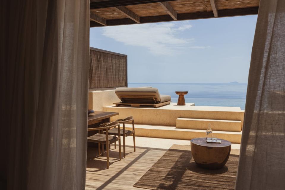 Enjoy cliff edge views from a private terrace in the Cave Suite (Gundari)