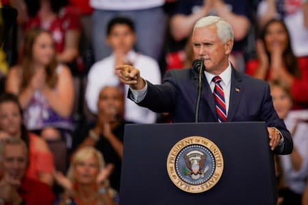 FILE PHOTO: U.S. Vice President Mike Pence gestures to supporters in Cincinnati