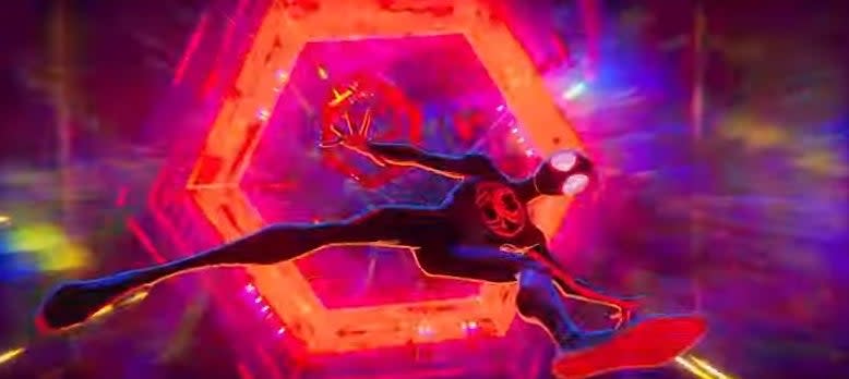 Miles falling through a hexagon-shaped portal in "Spider-Man: Across the Spider-Verse (Part One)"