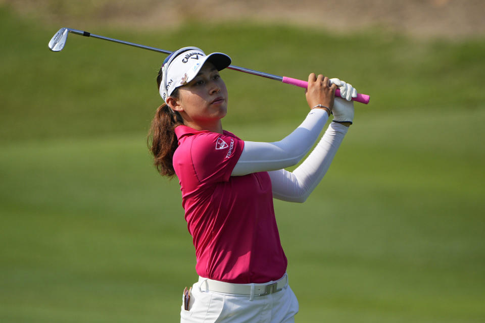 Atthaya Thitikul of Thailand hits on the fairway on the second hole during the final round of the LPGA Maybank Championship in Kuala Lumpur, Malaysia, Sunday, Oct. 29, 2023. (AP Photo/Vincent Thian)