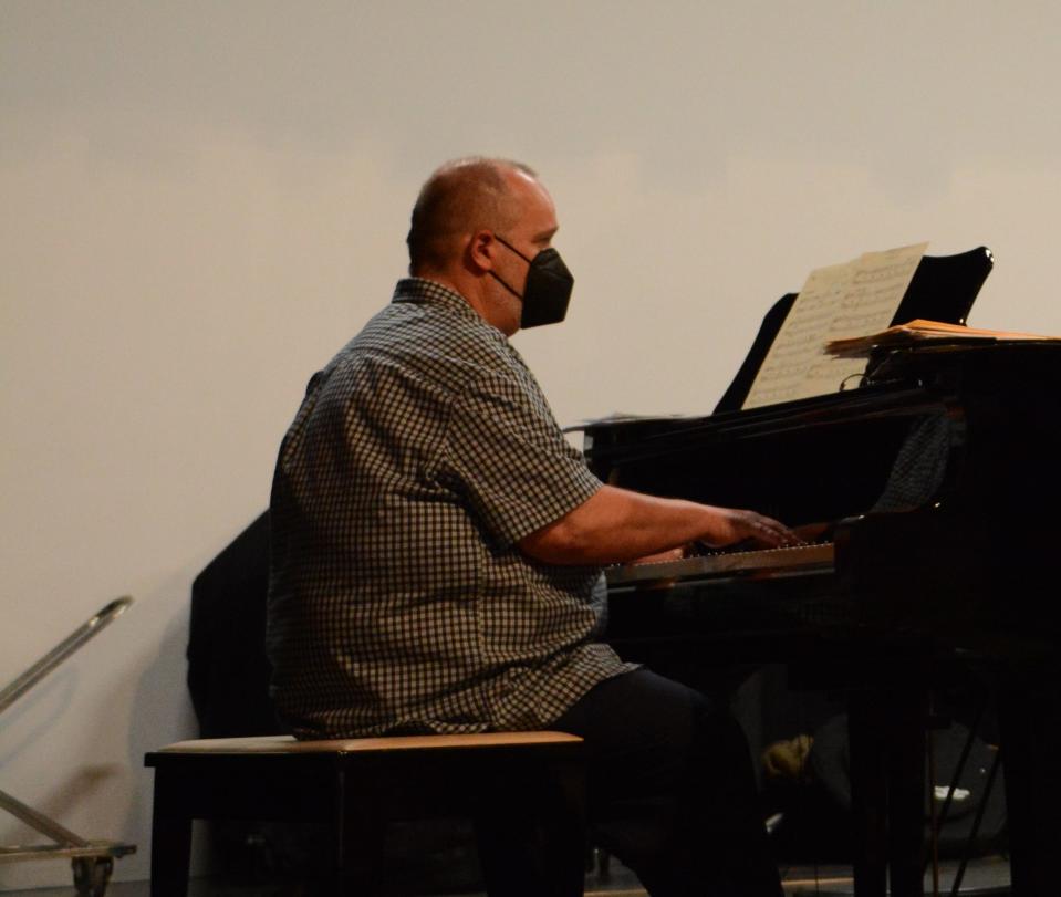 Keyboardist David Rains tickles the ivories during a recent TCA Big Band rehearsal ahead of the band's concert on May 15.