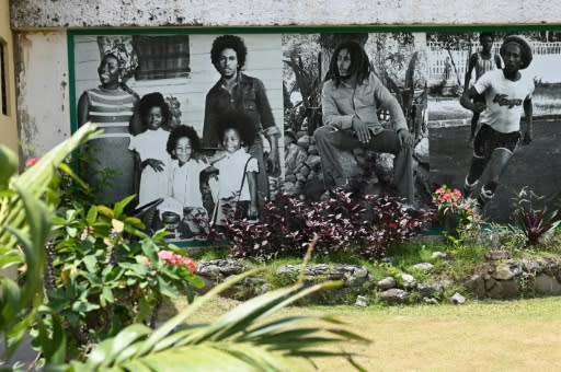 A mural at the Bob Marley Museum shows the singer playing football