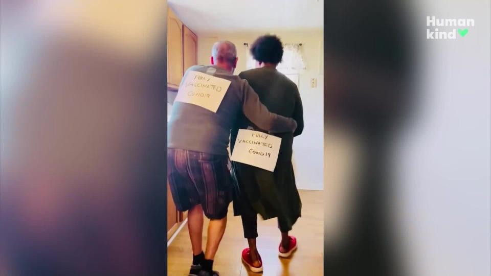 Dr. Tererai Trent and her husband Mark break into dance in their Lancaster, Virginia kitchen, celebrating their second COVID19 vaccination.