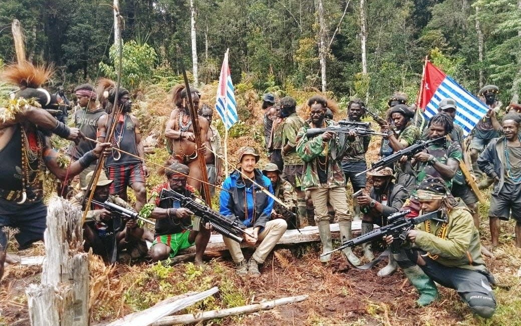 Philip Mehrtens paraded by members of the West Papua National Liberation Army - Reuters