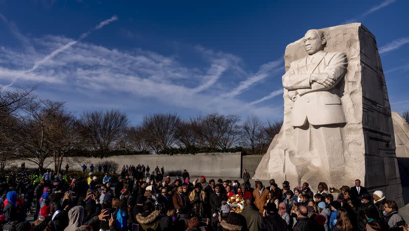 A large group gathers to watch a wreath-laying ceremony at the Martin Luther King Jr. Memorial on Martin Luther King Jr. Day in Washington, Monday, Jan. 16, 2023. King’s legacy should last all year long.