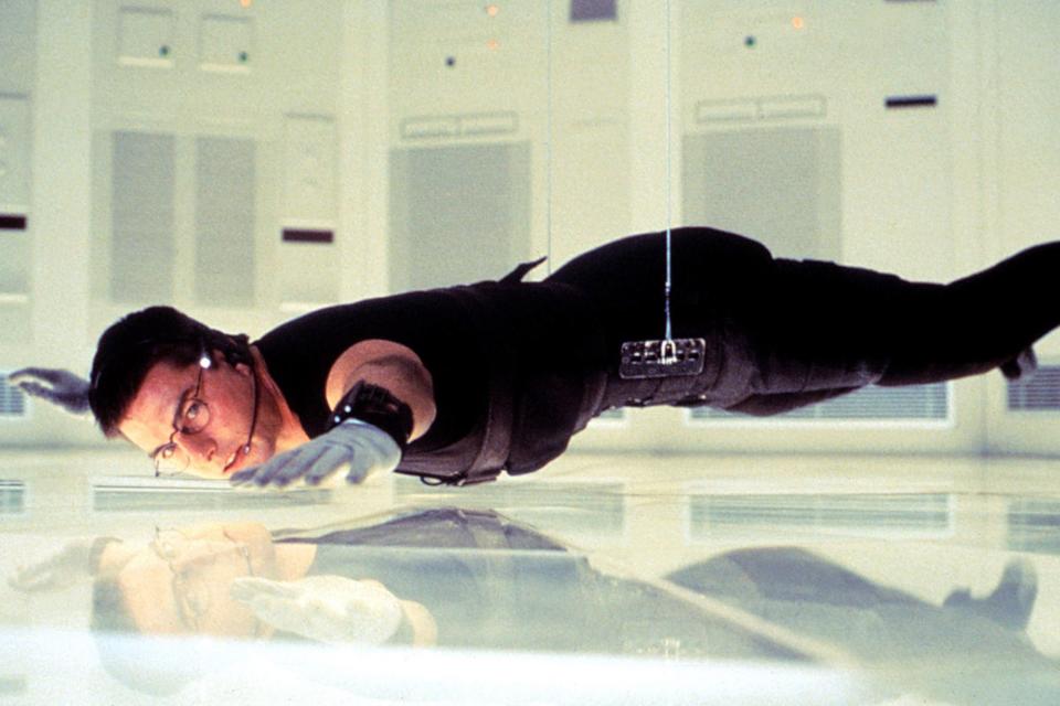 <p>It's been almost 25 years and five sequels since Cruise made his debut as Ethan Hunt and, despite all of the high-stakes action that has taken place in-between, the quintessential moment is still the on-the-run spy breaking into CIA HQ and dangling from the roof. He doesn't say a word, but Cruise's sweat and face do all the work in the quiet, tense-filled sequence.</p> <p><b>Related: </b><a href="https://ew.com/article/1996/06/21/how-do-you-spell-mission-impossible/" rel="nofollow noopener" target="_blank" data-ylk="slk:How do you spell Mission: Impossible's theme?;elm:context_link;itc:0;sec:content-canvas" class="link ">How do you spell <i>Mission: Impossible</i>'s theme?</a></p>