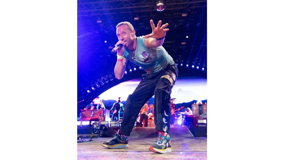 Chris Martin of Coldplay performs as the band headline the Pyramid stage during day four of Glastonbury Festival 2024