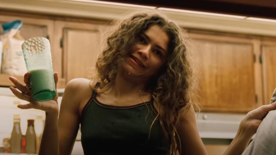 Zendaya's Rue holds a glass in her kitchen in Euphoria season 2