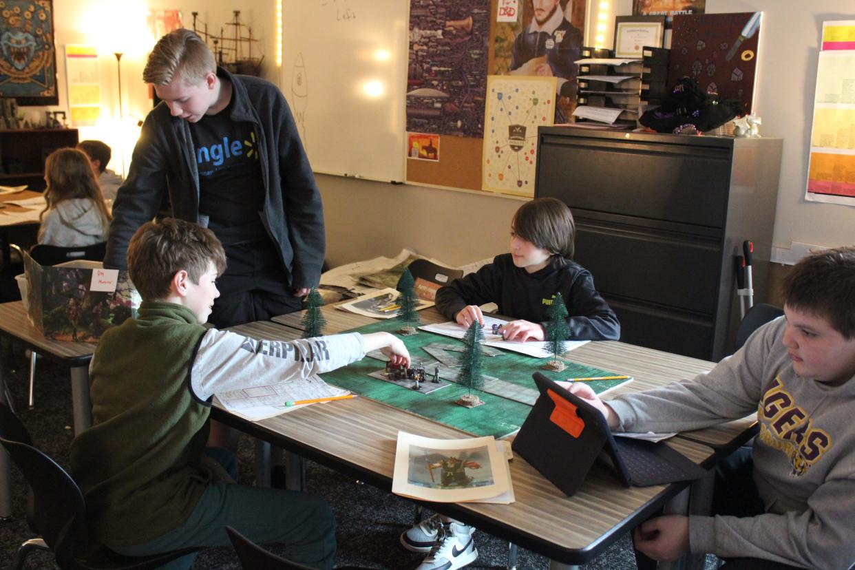 Jack Bergan leads his peers in a game of Dungeons & Dragons in Kade Wells' classroom at Harrisburg East Middle School on Friday, March 22, 2024.