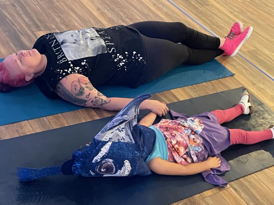 Katie Donzanti's 5-year-old daughter takes yoga classes with her at her Orlando, Fla. yoga studio. (Photo: Katie Donzanti)