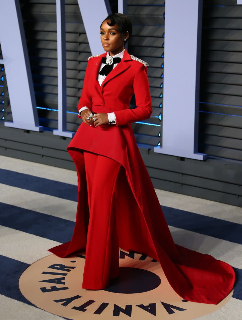 <p>The singer and actress modeled a bright red Christian Siriano suit. (Photo: JEAN-BAPTISTE LACROIX/AFP/Getty Images) </p>