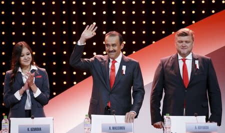 Kazakhstan's Prime Minister Karim Massimov (C) acknowledges the audience during the Almaty 2022 Presentation at the 128th International Olympic Committee (IOC) Session in Malaysia's capital city of Kuala Lumpur July 31, 2015. REUTERS/Edgar Su