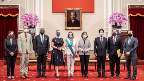 PHOTO: Speaker of the U.S. House Of Representatives Nancy Pelosi poses for photographs after receiving the Order of Propitious Clouds with Special Grand Cordon, Taiwan's highest civilian honor at the president's office in Taipei, Taiwan, Aug. 3, 2022. (Chien Chih-Hung/Office of The President via Getty Images)