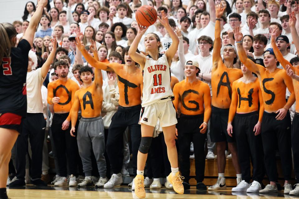 Oliver Ames Avery Gamble attempts a three-point basket during a game against Whitman-Hanson on Friday, March 8, 2024.