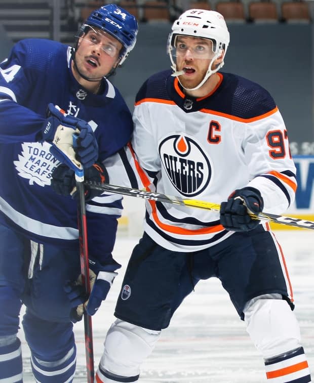 Auston Matthews, left, and Connor McDavid, right, are two of the biggest offensive threats in the NHL. Their respective teams begin a three-game series in Edmonton on Saturday, but Matthews will miss at least the first game due to an injury. (File/Getty Images - image credit)
