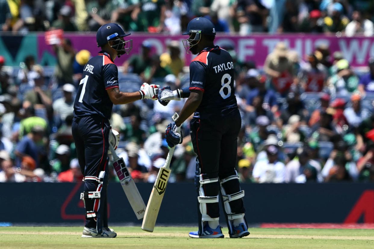 USA's captain Monank Patel and USA's Steven Taylor congratulate each other during the ICC men's Twenty20 World Cup 2024 group A cricket match between the USA and Pakistan at the Grand Prairie Cricket Stadium in Grand Prairie, Texas, on June 6, 2024. (Photo by ANDREW CABALLERO-REYNOLDS / AFP) (Photo by ANDREW CABALLERO-REYNOLDS/AFP via Getty Images)