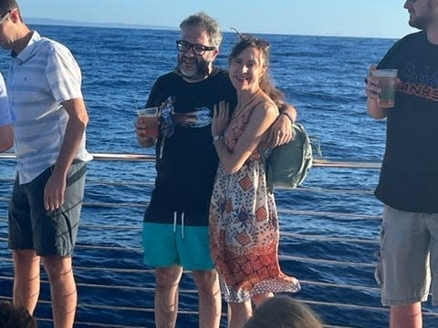 Yossi Rosenberg, left, and Ivy Branin, right, on a boat.