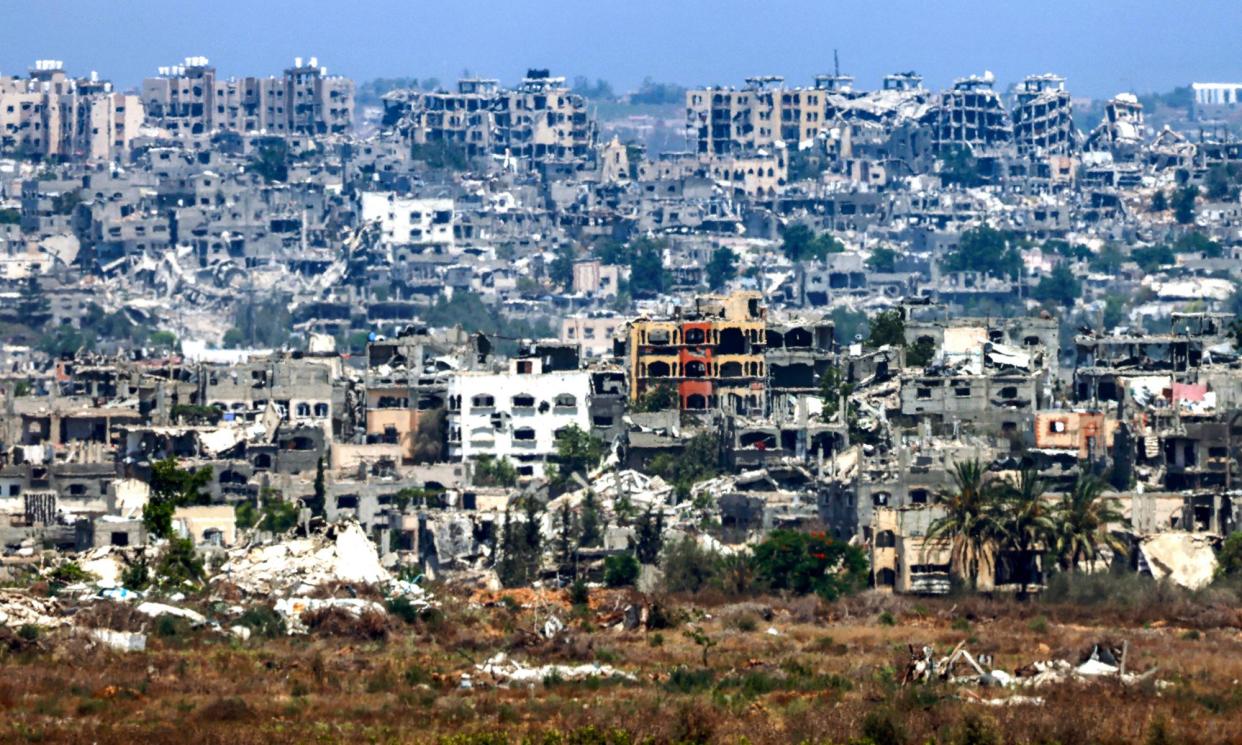 <span>Destroyed buildings near the border with the Gaza Strip and southern Israel on 2 July.</span><span>Photograph: Jack Guez/AFP/Getty Images</span>