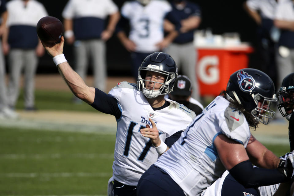 Tennessee Titans quarterback Ryan Tannehill throws a pass against the Jacksonville Jaguars during the first half of an NFL football game, Sunday, Dec. 13, 2020, in Jacksonville, Fla. (AP Photo/Stephen B. Morton)