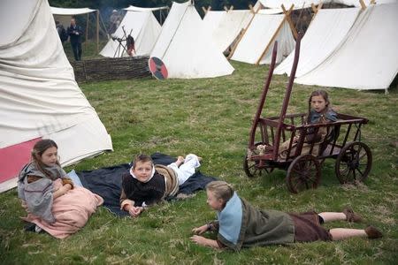 Re-enactors dress in historical costume as part of the Battle of Hastings anniversary commemoration events in Battle, Britain October 15, 2016. REUTERS/Neil Hall