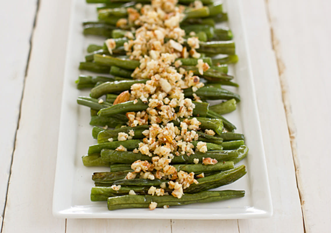 <p>Courtesy of ohmyveggies.com</p><p>Green Bean Almondine (green beans and almonds) is a classic combination, so try this twist with a pesto made with almonds.</p><p><strong>Get the recipe: <a href="https://ohmyveggies.com/green-beans-with-lemon-almond-pesto/" rel="nofollow noopener" target="_blank" data-ylk="slk:Green Beans with Lemon Almond Pesto;elm:context_link;itc:0;sec:content-canvas" class="link rapid-noclick-resp">Green Beans with Lemon Almond Pesto</a></strong></p>