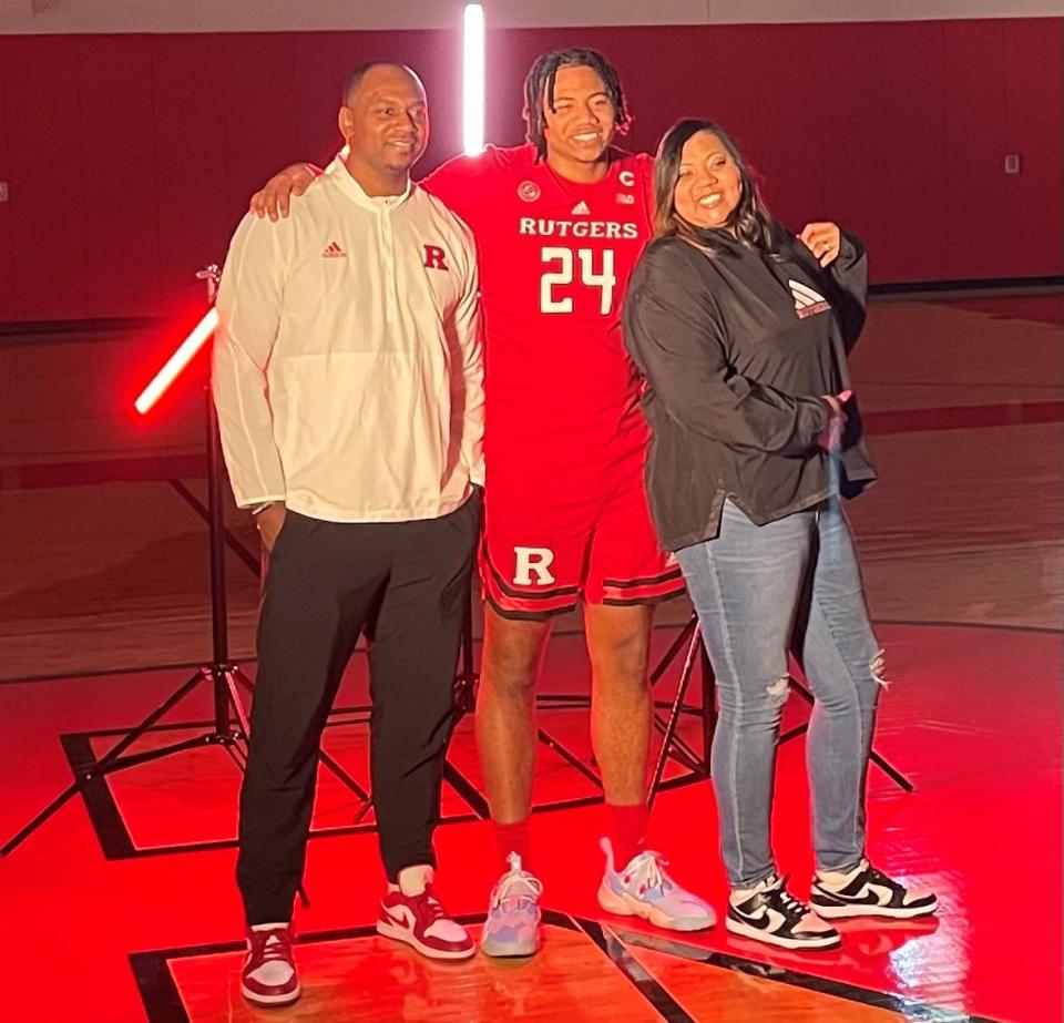 New Rutgers commit Lathan Sommerville (center) with parents Marcellus and Brooke