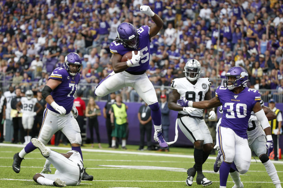 Minnesota Vikings running back Alexander Mattison (25) scores on a 10-yard touchdown run during the second half of an NFL football game against the Oakland Raiders, Sunday, Sept. 22, 2019, in Minneapolis. (AP Photo/Bruce Kluckhohn)