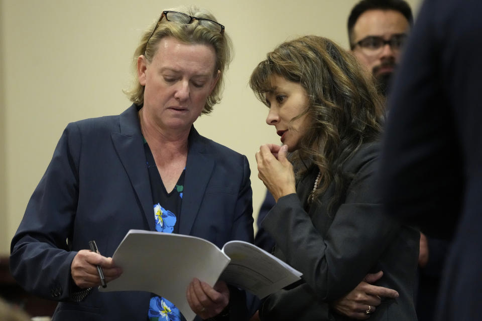 Special prosecutors Kari Morrissey, left, and Erlinda Ocampo Johnson speak during actor Alec Baldwin's hearing in Santa Fe County District Court, Wednesday, July 10, 2024, in Santa Fe, N.M. Baldwin is facing a single charge of involuntary manslaughter in the death of a cinematographer. (AP Photo/Ross D. Franklin, Pool)