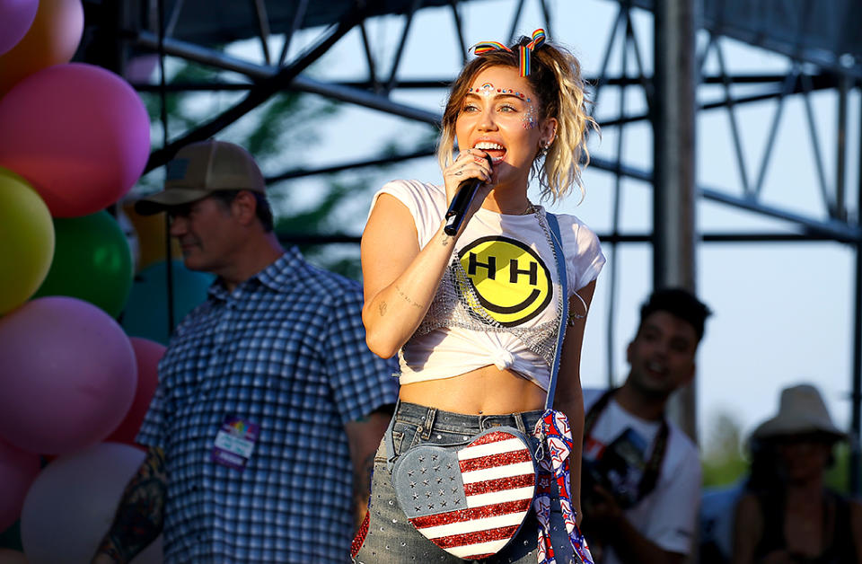 <p>Cyrus brought her Happy Hippie Foundation to Washington, D.C., for the 2017 Capital Pride Concert. She wore a rainbow painted on her forehead and some funky, <a rel="nofollow" href="https://www.yahoo.com/celebrity/celebrities-celebrate-pride-2017-160015967.html" data-ylk="slk:bedazzled jeans;elm:context_link;itc:0;sec:content-canvas;outcm:mb_qualified_link;_E:mb_qualified_link;ct:story;" class="link  yahoo-link">bedazzled jeans</a> for her performance. (Photo: John Lamparski/WireImage) </p>