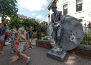 <p>An artist called “Le Gouverneur” takes part in the festival “Statues en Marche” in Marche-en-Famenne, Belgium, July 22, 2018. (Photo: Yves Herman/Reuters) </p>