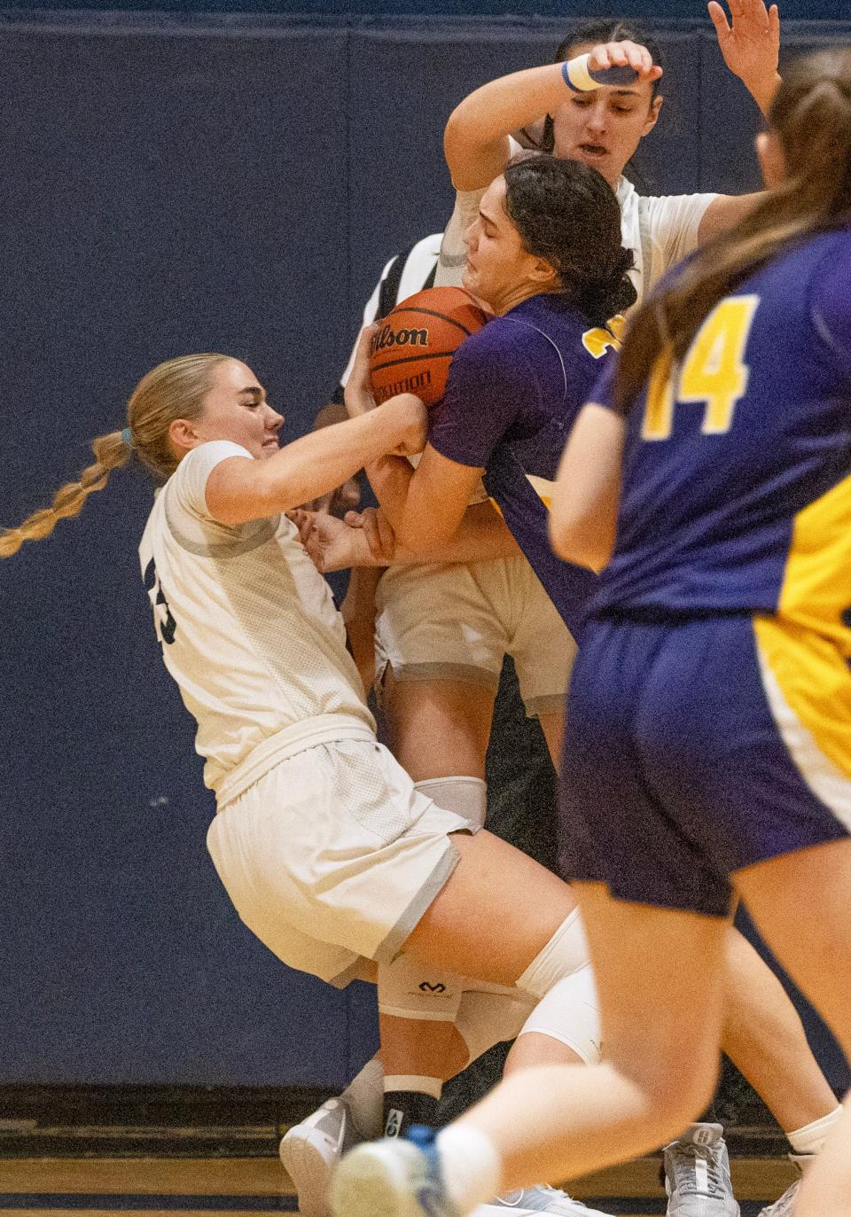 Manasquan Hope Masonius and St Rose Brooke Missry battle for a loose ball in first half action. St. Rose Girls Basketball vs Manasquan SCT Quarterfinal game in Middletown, NJ on February, 10 2024