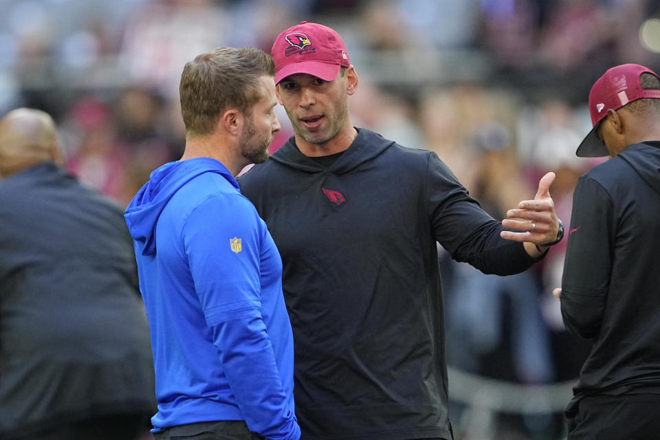 Los Angeles Rams head coach Sean McVay, left, talks with Arizona Cardinals head coach Jonathan Gannon before an NFL football game, Sunday, Nov. 26, 2023, in Glendale, Ariz. (AP Photo/Matt York)