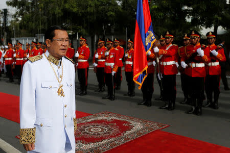 Cambodia's Prime Minister Hun Sen arrives at the celebration marking the 64th anniversary of the country's independence from France, in Phnom Penh, Cambodia November 9, 2017. REUTERS/Samrang Pring