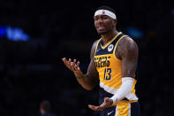 Indiana Pacers forward Torrey Craig (13) reacts to a foul call during the first half of an NBA basketball game against the Los Angeles Lakers in Los Angeles, Wednesday, Jan. 19, 2022. (AP Photo/Ashley Landis)