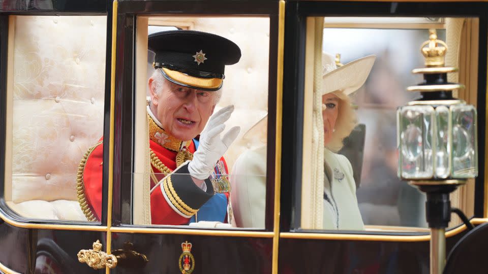King Charles III and Queen Camilla travel along The Mall to the Trooping the Colour ceremony. - James Manning/PA Wire