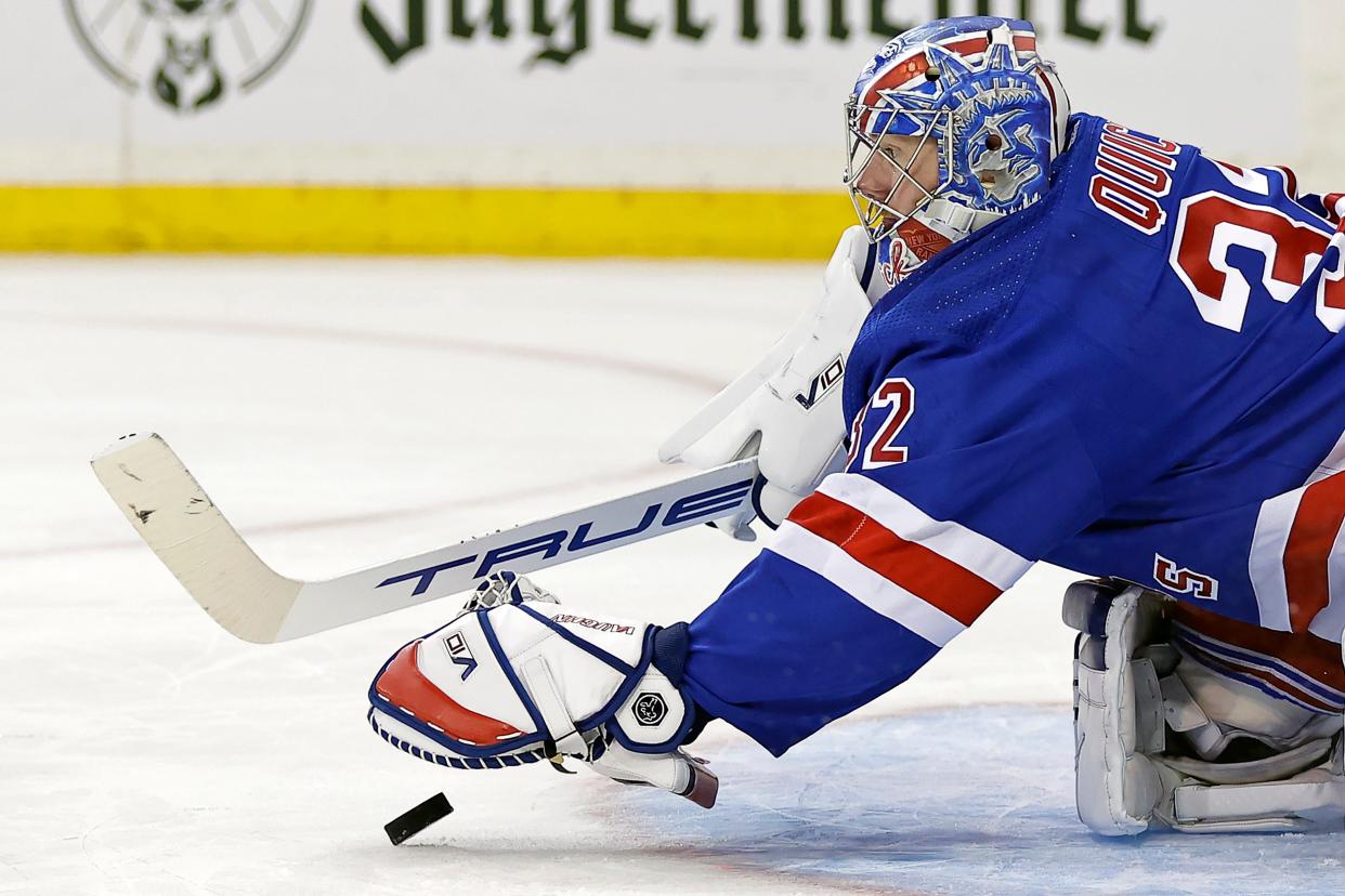 New York Rangers goaltender Jonathan Quick covers up the puck against the Detroit Red Wings in the first period of an NHL hockey game Tuesday, Nov. 7, 2023, in New York.
