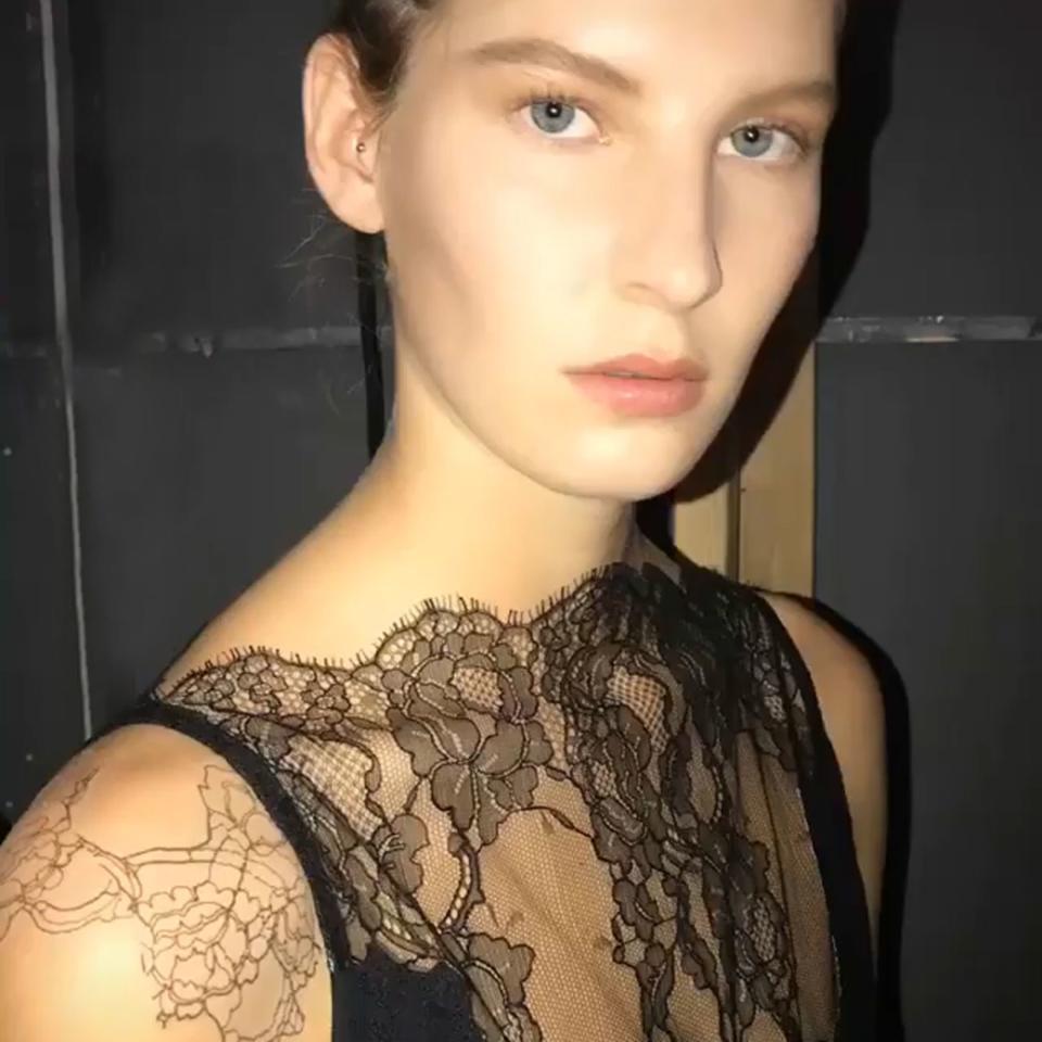 At Dion Lee's Sping 2019 show, a selection of models sported temporary tattoos that mirrored the collection's lace.