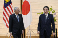 Japan's Prime Minister Fumio Kishida, right, and Malaysian Prime Minister Ismail Sabri Yaakob, left, speak after exchanging memorandum at the Prime Minister's official residence Friday, May 27, 2022 in Tokyo. (AP Photo/Eugene Hoshiko, Pool)